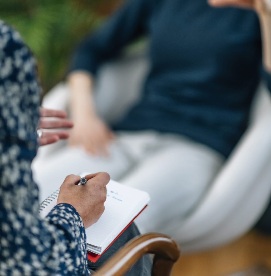 NLP or Neuro-linguistic Programming Practitioner having a Conversation with a client